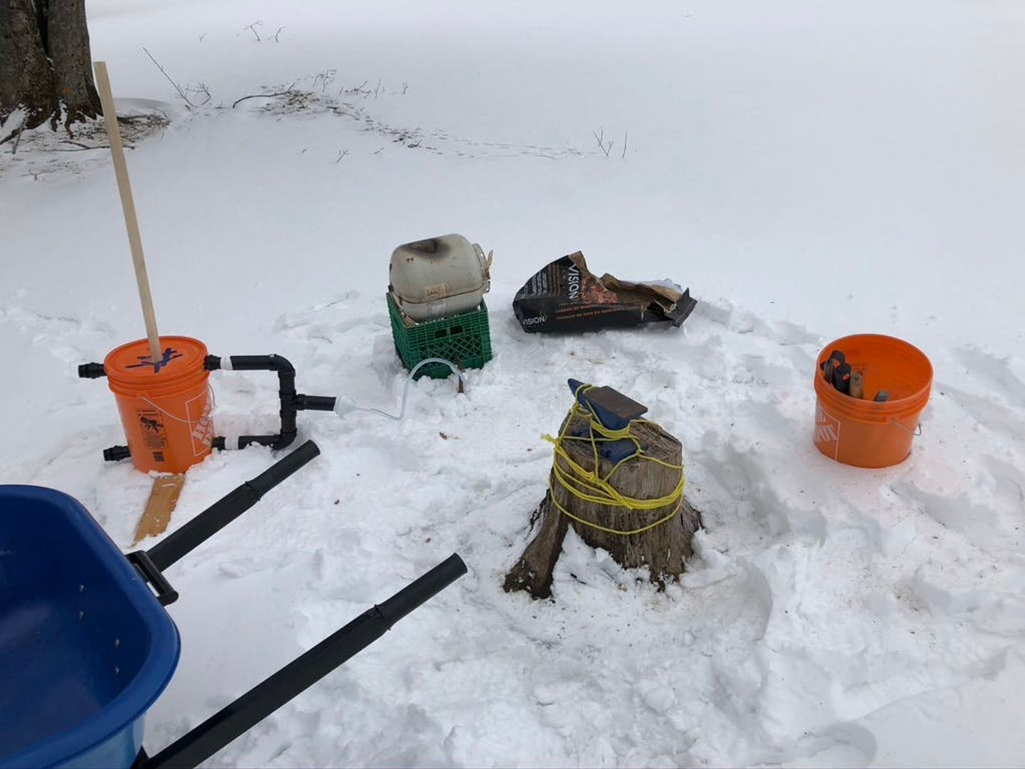 Bucket bellows and my tiny anvil on a stump at last